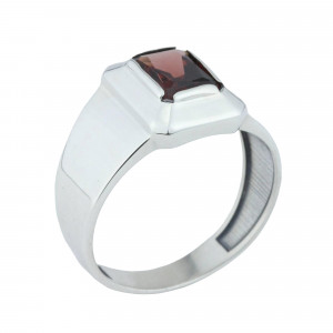 Серебряное кольцо с гранатом к10355